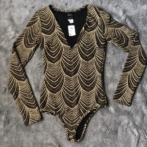 Gold Glitter performance long sleeved leotard